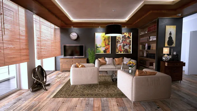 Modern living room with neutral-toned seating, wood flooring, art, and a dark accent wall featuring a TV and bookshelf.